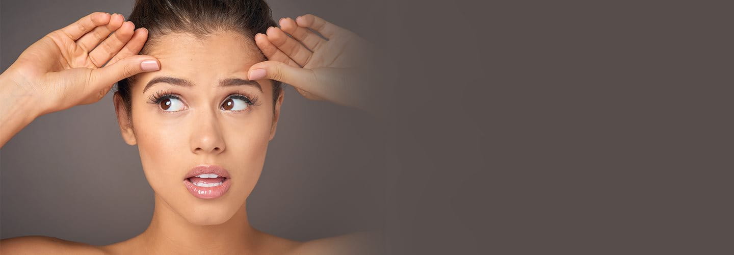 Rughe sulla fronte: cause e rimedi per le rughe glabellari | Eucerin